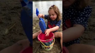 Building Sand Castles At The Beach