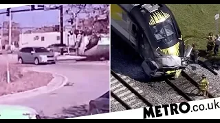 Horrific moment driver is killed after trying to beat speeding train at crossing