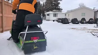 Just having a little fun with my 1974 John Deere JD600 snowmobile in the backyard