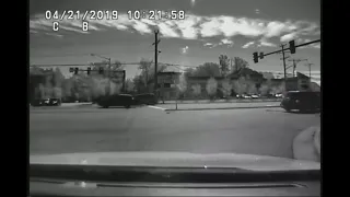 Dashcam video: Bicyclist collides with police officer, charged with not paying attention