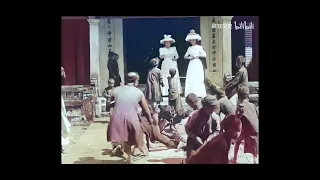 Viceroy's wife and daughter throw coins to children during French colonial Vietnam