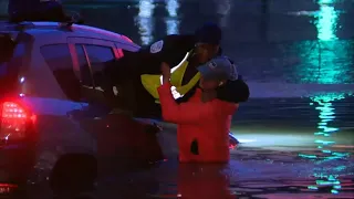 Dallas flooding: Woman rescued from vehicle stuck in high water
