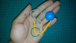 Ring and ball / Cowboy's Hobble metal string puzzle solution