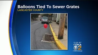 Teen Takes Credit For Red 'It' Balloons Tied To Sewer Grates