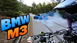 Chasing tuned BMW M3 on a mountain road