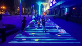 Outdoor floor projection game