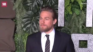 Charlie Hunnam is handsome in blue at Triple Frontier premiere