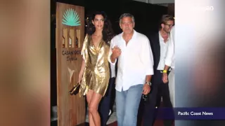 George Clooney photobombs Cindy Crawford