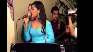 Chhom Nimol sings "Kom Mork Vea Cha"