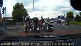 Moment unmarked police motorbikes intercept mopeds in Manchester