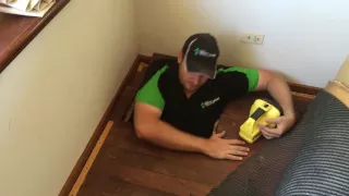 Cutting a trap for sub-floor access.