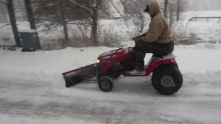 Plowing snow with lawn tractor WITHOUT TIRE CHAINS using 22in. atv tires.