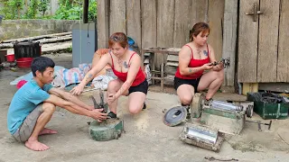 The mechanic girl helped her neighbor fix an old rice peeling machine with broken balls