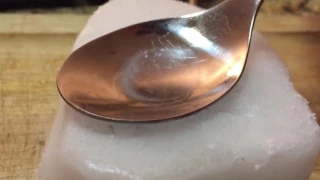 Water freezes and cracks on spoon (not sped up)