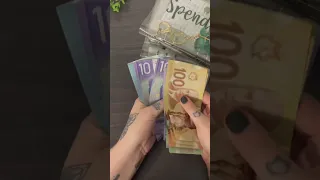 Counting Canadian currency $690 - so vibrant!!
