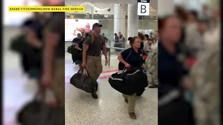 US firefighters met with applause arriving at Australia airport to help battle wildfires | ABC7