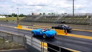 Electric Porsche 911 vs. Electric AC Cobra