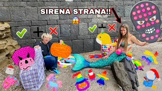 SCAMBIAMO POP-IT RARI CON UNA SIRENA A MARE!! *abbiamo perso tutto*