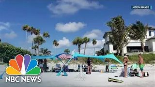 Florida Residents Push Back On Town's Beach Umbrella Ban