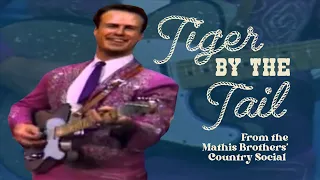 Tiger By the Tail by Buck Owens and the Buckaroos