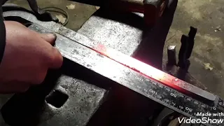 Forging Ken's custom iron bolt tongs.