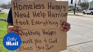 Homeless couple rides out Hurricane Ida under a bridge in Louisiana