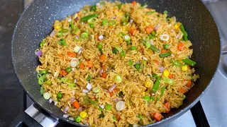 Rice with vegetables. It’s so tasty and delicious!