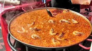 London Street Food. Preparing a Fresh Spanish Giant Paella with Seafood. Seen in Brick Lane