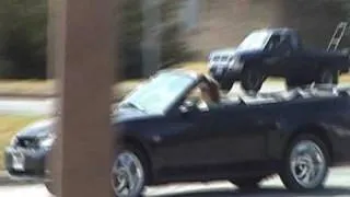 Wife hitting curb in husband's new car