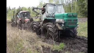 Xtz T-150K modified into a swamp forwarder saving Belarus Mtz 1025 and Mtz 82