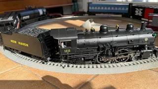 Lionel Legacy Atlantic 4-4-2 New Haven #1111 pulling MTH and Menards freight train rolling stock!
