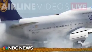 Watch: Boeing 747 makes bumpy touch-and-go at LAX