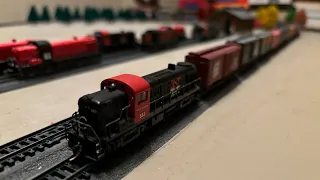 Kato RS-3 with New Microtrains NH Boxcar