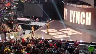 Becky Lynch checks up on a hurt Seth Rollins