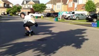 kyle doing sittdown slide on landyachtz evo