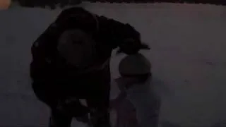 Emma Tolly and her Mom Making Snow Angels