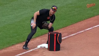 Bobby Dickerson instructs Renato Núñez on a proper tag