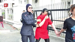 Woman charged with killing Indonesian maid, injuring Cambodian