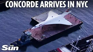 Watch incredible moment BA's iconic Concorde floats down Hudson river in NYC after being restored