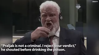 VIDEO: Convicted War Criminal Drinks Poison in Court