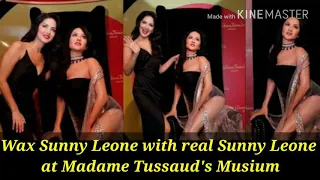Wax Sunny with Real Sunny at madam Tussaud's museum.