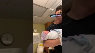 Dad Holding His Newborn Baby Starts Crying