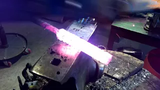 Forging a damascus knife part 1, drawing out and twisting our 12 layer billet..