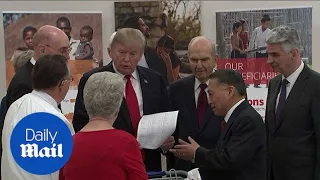 Trump meets with Mormon leaders and visits a food pantry - Daily Mail