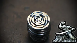 Damascus steel "Dinosaur Skin", from a plumbing cable.