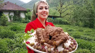 Cooking traditional food with walnut and chicken (fesenjan)