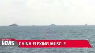 China stages major naval and air force exercises