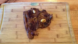 Pan-fry a T bone steak