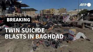 Twin suicide blasts in Baghdad leave nearly 30 dead | AFP