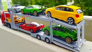 Car transporter with small cars metal from welly new
